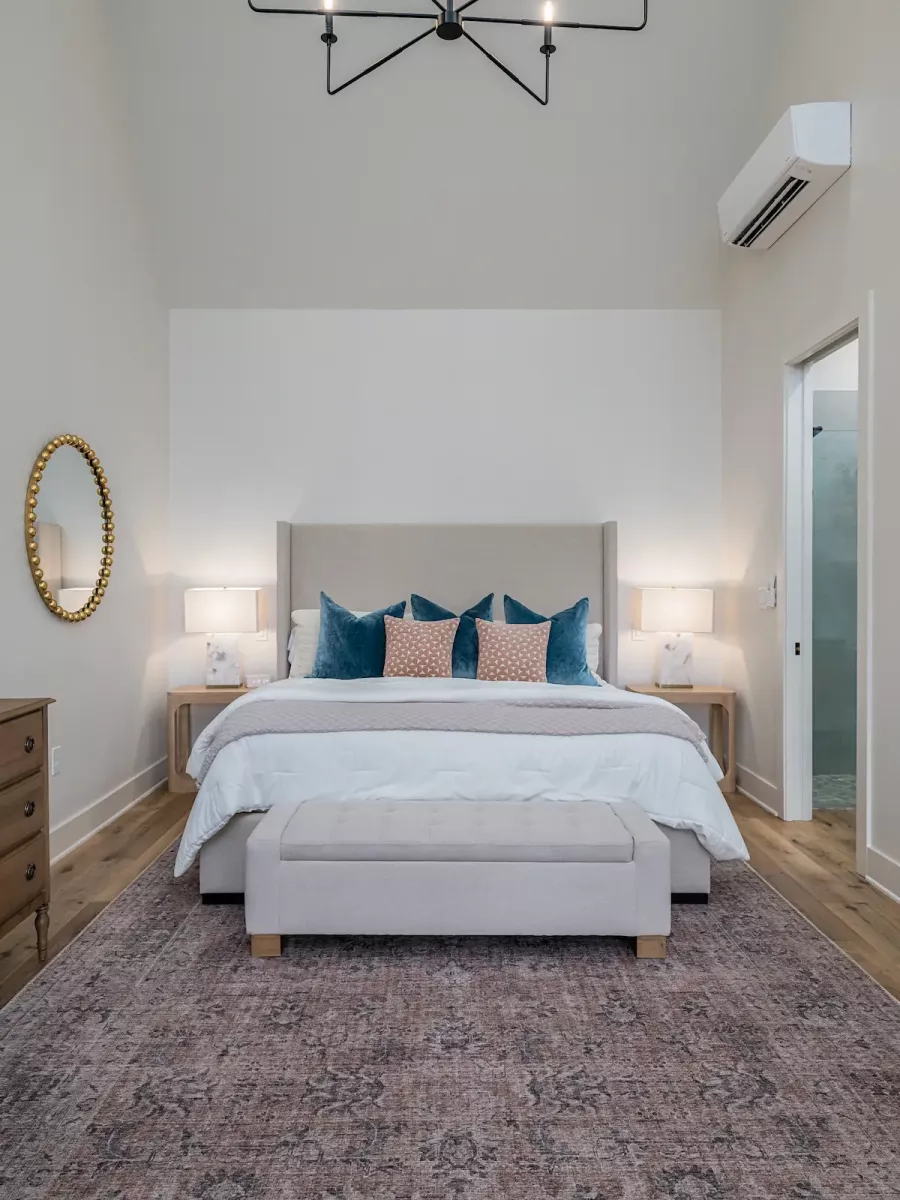 The-Floret-cabin-for-rent-in-Tyler-Texas-features-a-king-size-bed-and-gorgeous-chandelier